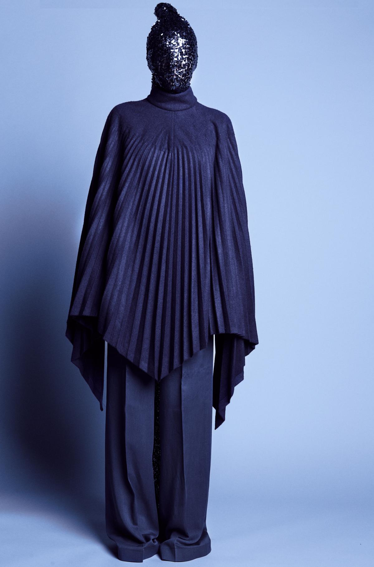 Navy pleated 'You talk too much' poncho coat